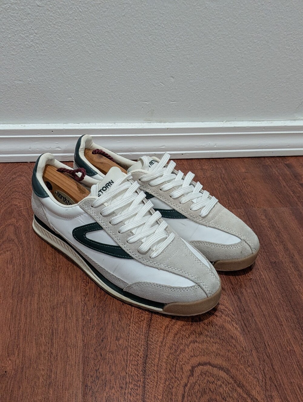 Tretorn Rawlins 2.0 lace-up jogging sneakers in a white and black colorway.